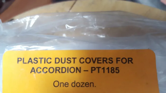 1185 One dozen dust covers for full-size accordion