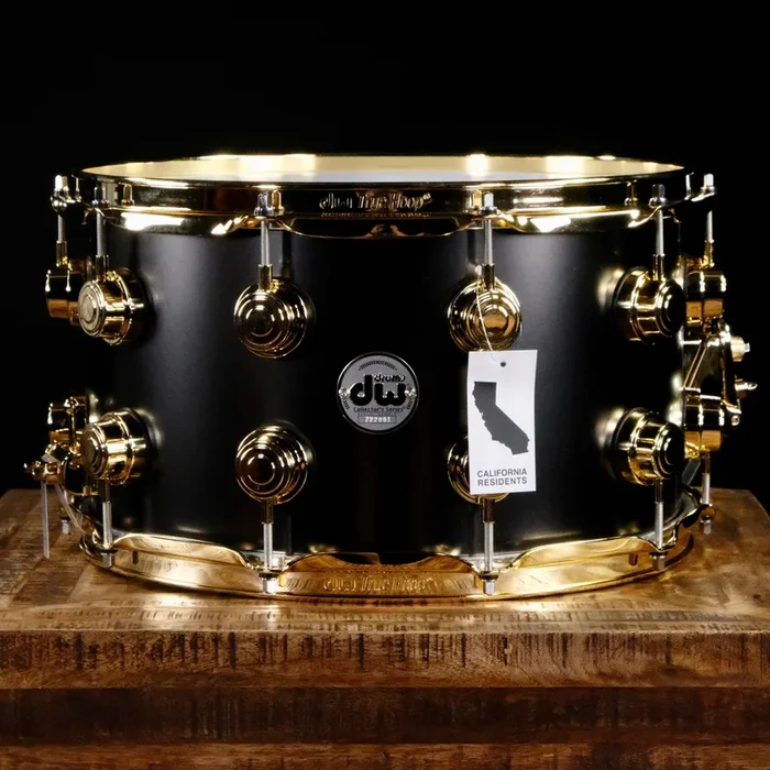 DW Collector’s Series Metal Snare Drum – 8-inch x 14-inch – Satin Black Over Brass – Gold Hardware