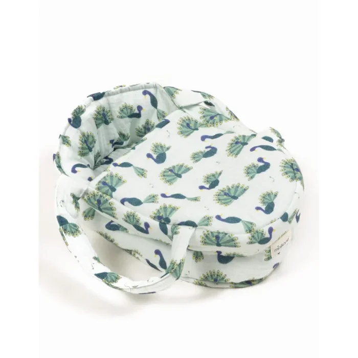 Minikane babies bassinet in baby peacock